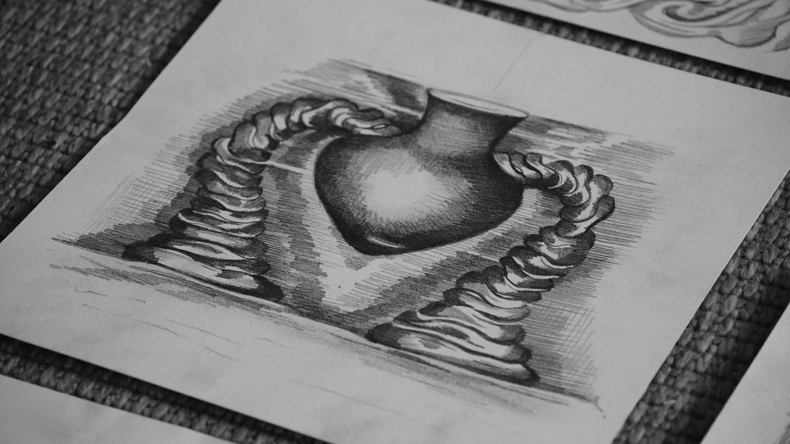 A single graphite drawing of a folded cavity form