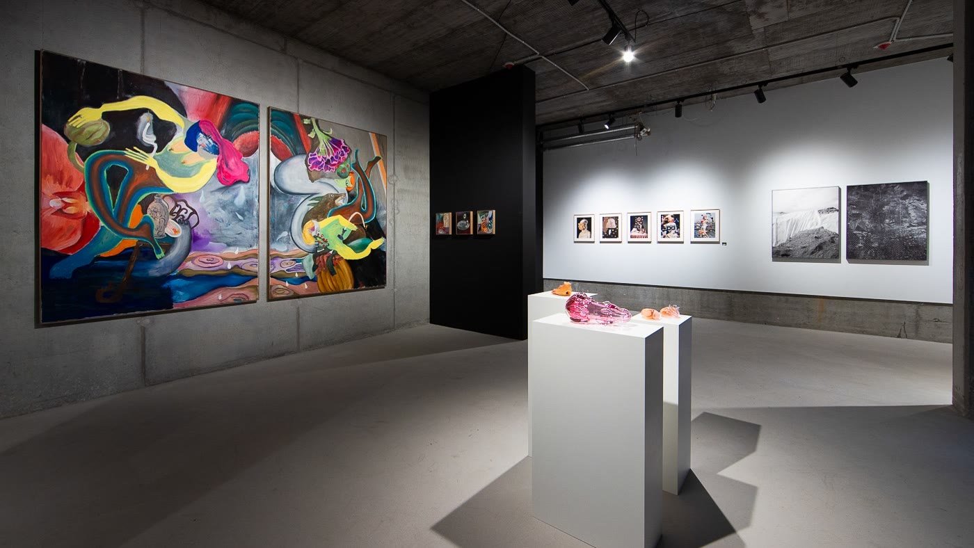The Infinite Forms group exhibition at Himera Gallery, paintings on the walls and a glass piece on a plinth